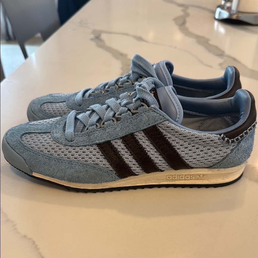 Adidas Blue and Black Sneakers with Classic Stripes